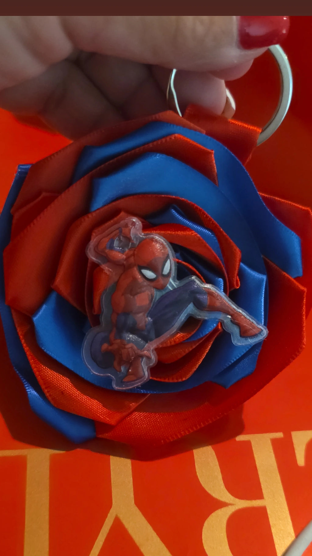 ❤️💙 Swing into style with our handmade Spider-Man Ribbon Rose Keychain