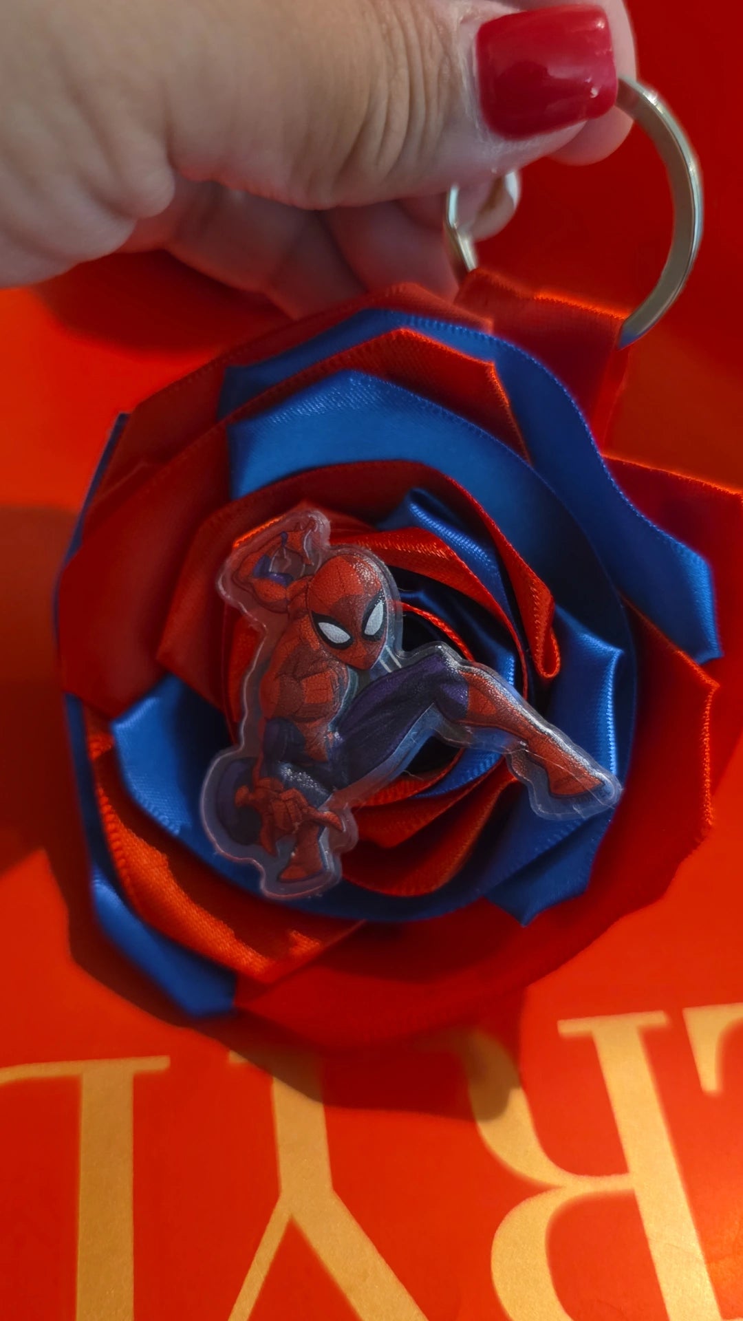 ❤️💙 Swing into style with our handmade Spider-Man Ribbon Rose Keychain